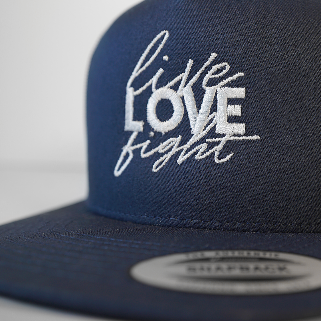 Gorra Trucker "Live Love Fight"